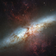 Illustration for article titled A colossal superwind is blowing all across this galaxy